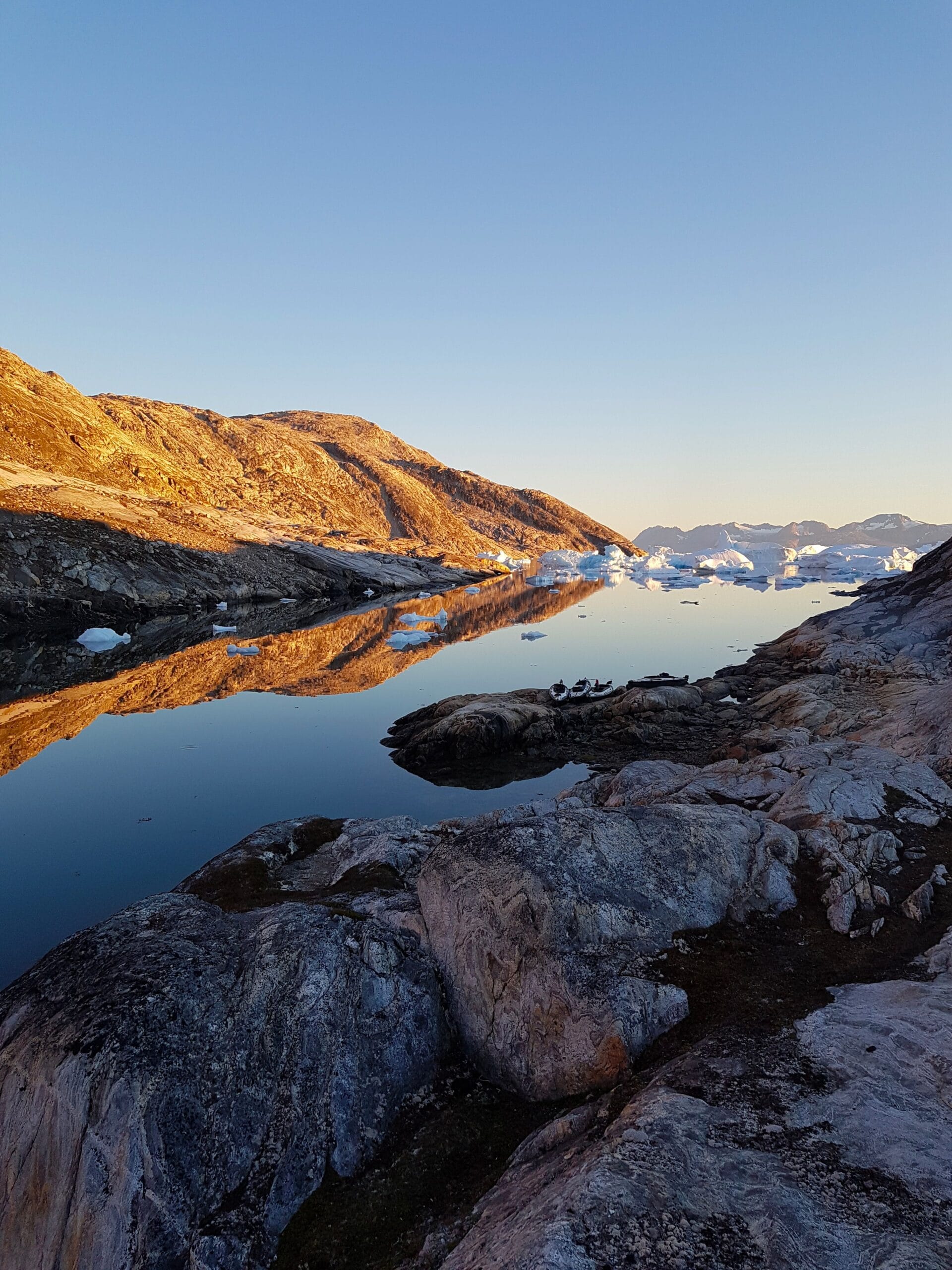 Greenland fjord surrounded by mountains